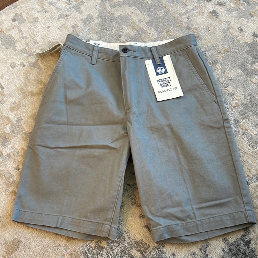 Never worn, tags still on. Straight fit.